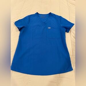 Figs scrub top. Medium 1-pocket v-neck top. Royal blue
